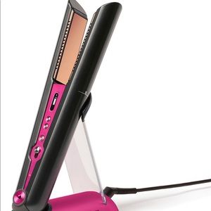 Used Dyson straightener. Works great still! Some minor scratches